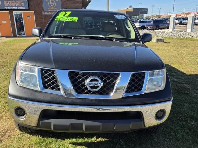 Black 2007 Nissan Frontier Pickup Truck Four-Wheel Drive Manual