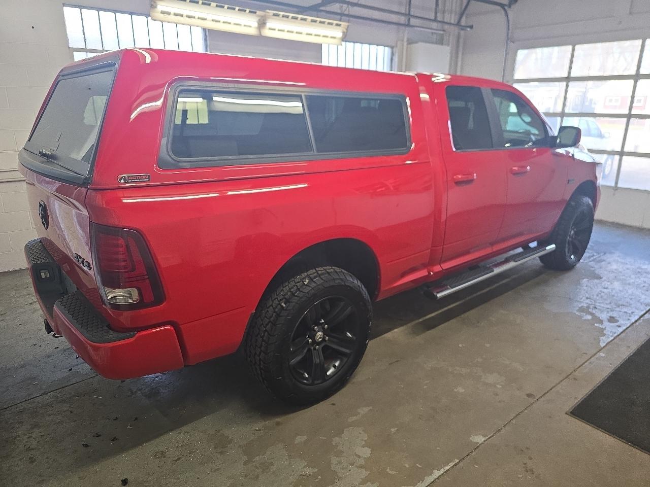 RAM 1500 4WD Quad Cab 140.5" Sport 2015