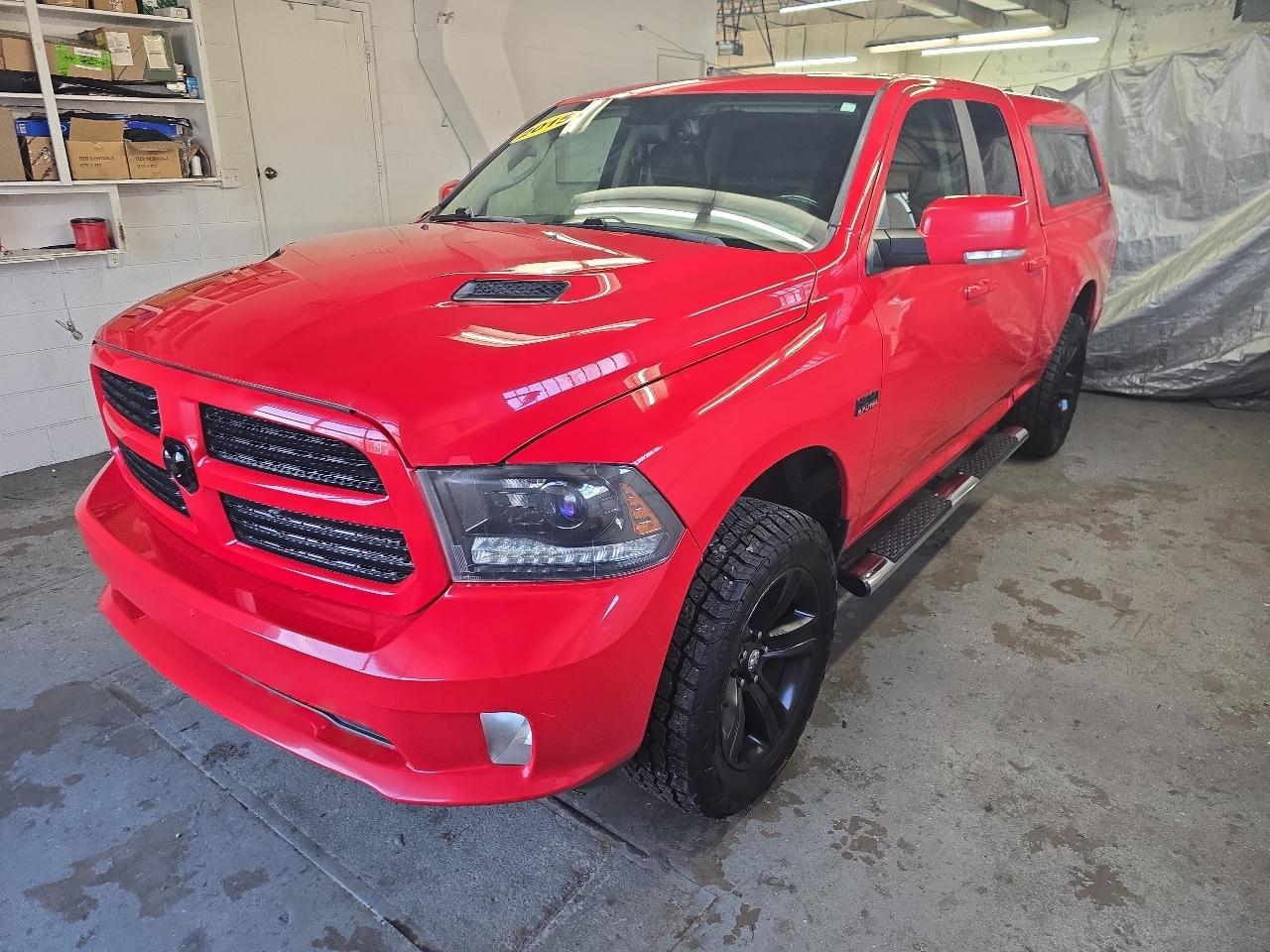 RAM 1500 4WD Quad Cab 140.5" Sport 2015