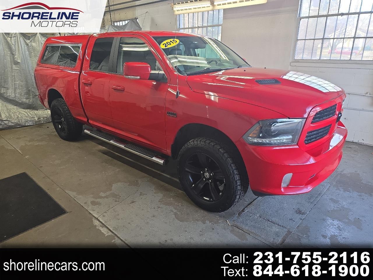 2015 RAM 1500 4WD Quad Cab 140.5" Sport