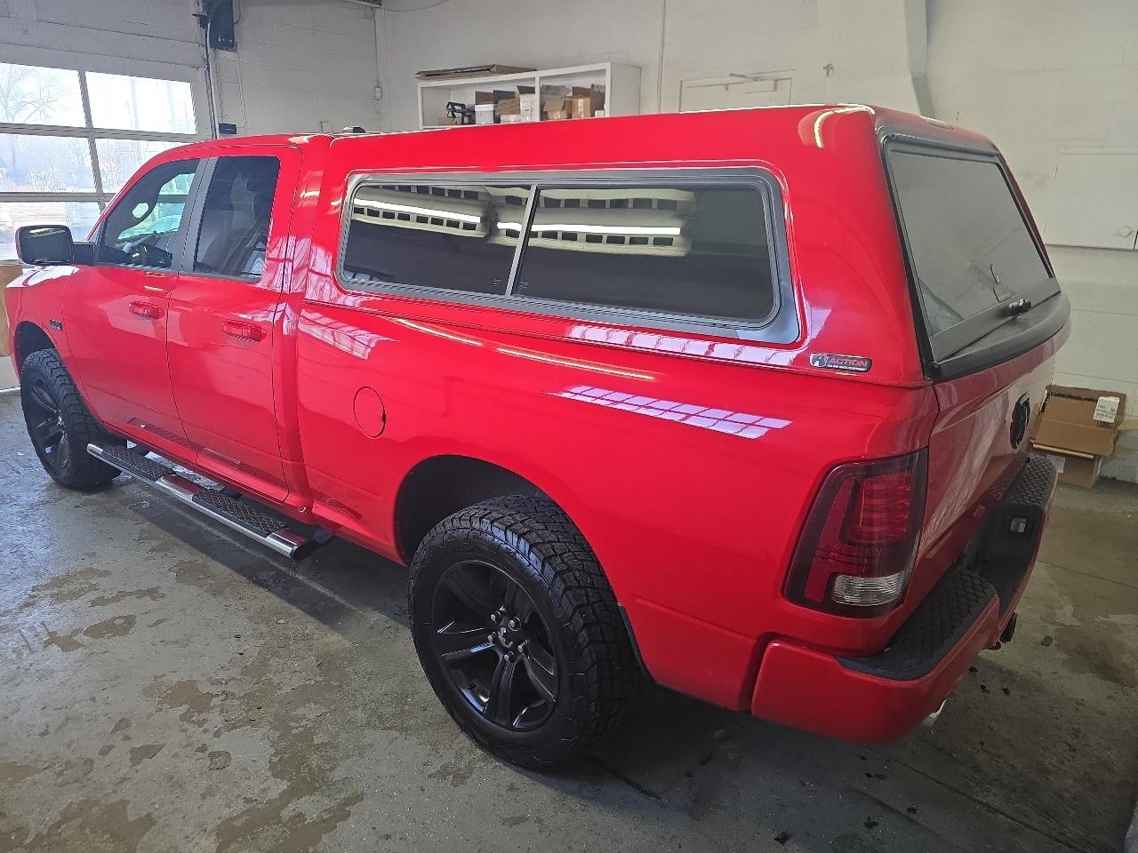 RAM 1500 4WD Quad Cab 140.5" Sport 2015