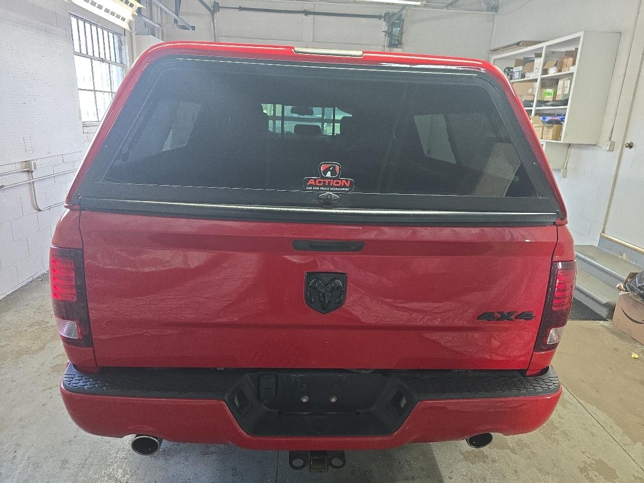 RAM 1500 4WD Quad Cab 140.5" Sport 2015