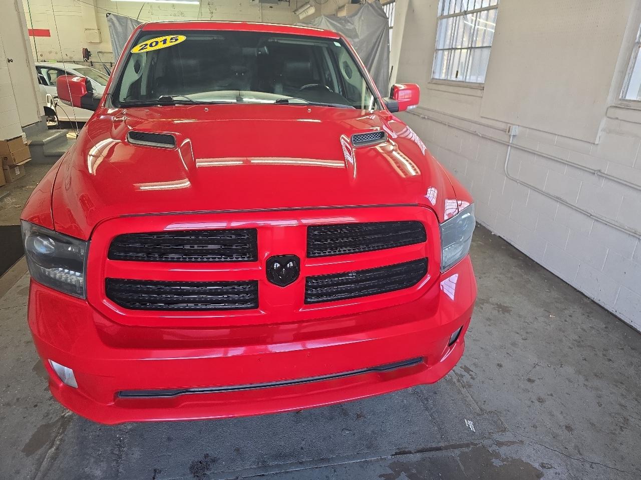 RAM 1500 4WD Quad Cab 140.5" Sport 2015