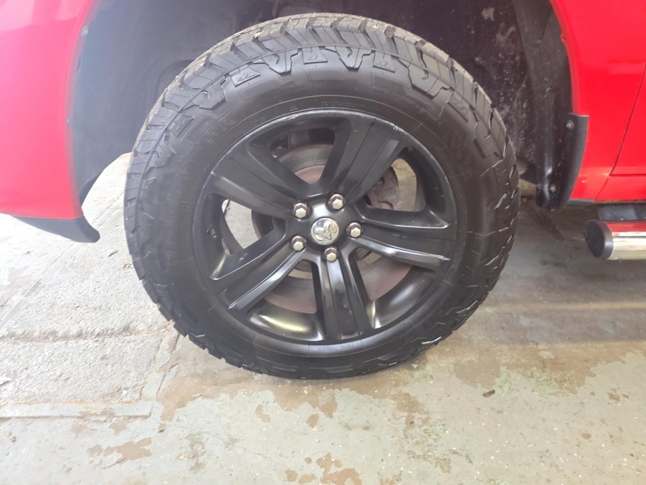 RAM 1500 4WD Quad Cab 140.5" Sport 2015