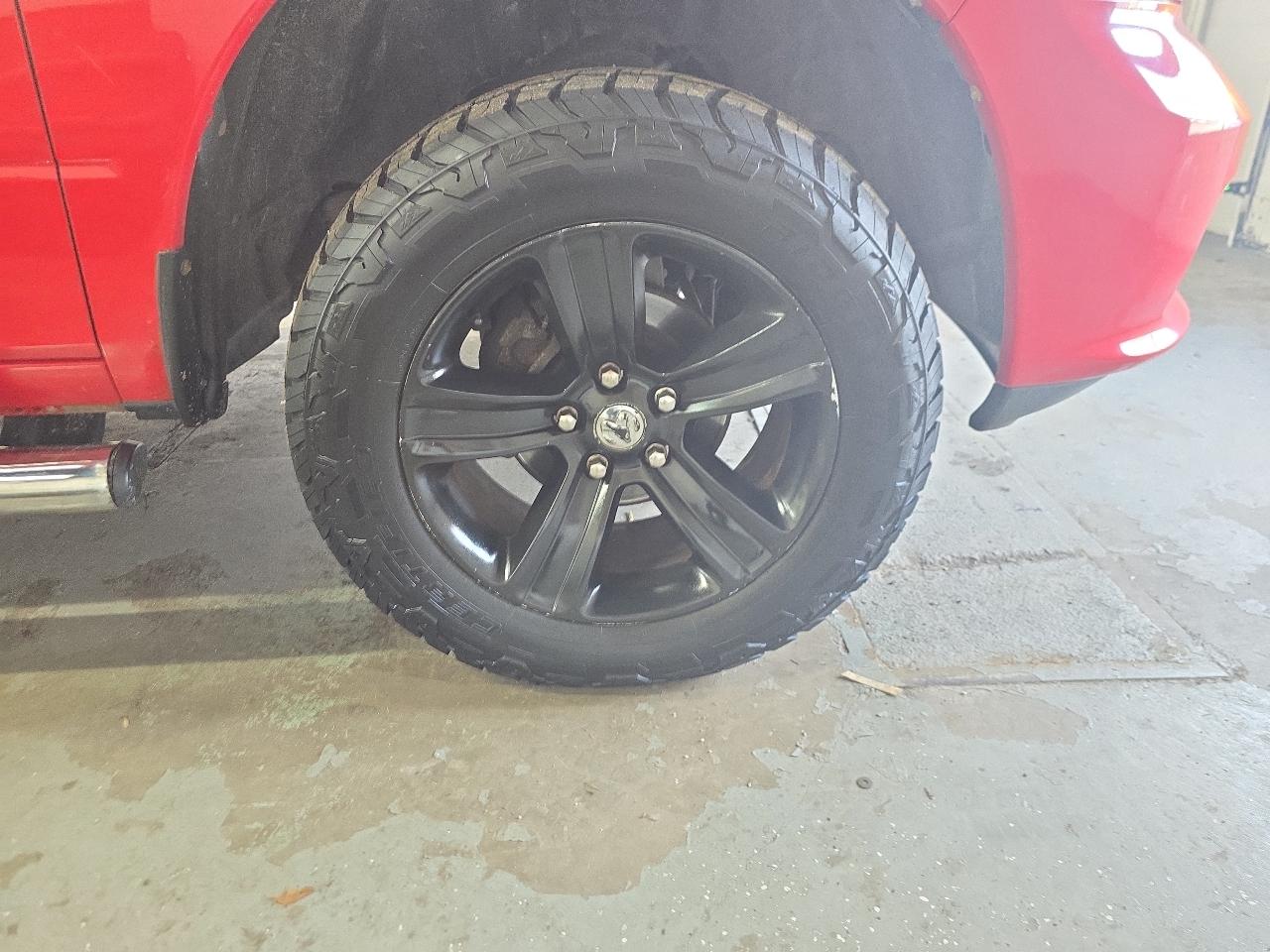 RAM 1500 4WD Quad Cab 140.5" Sport 2015