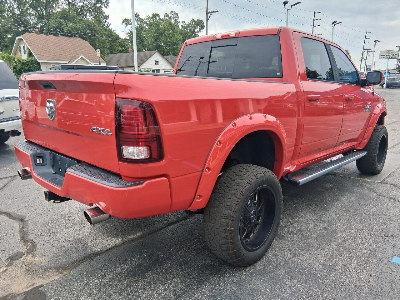 RAM 1500 4WD Crew Cab 140.5" Sport 2016