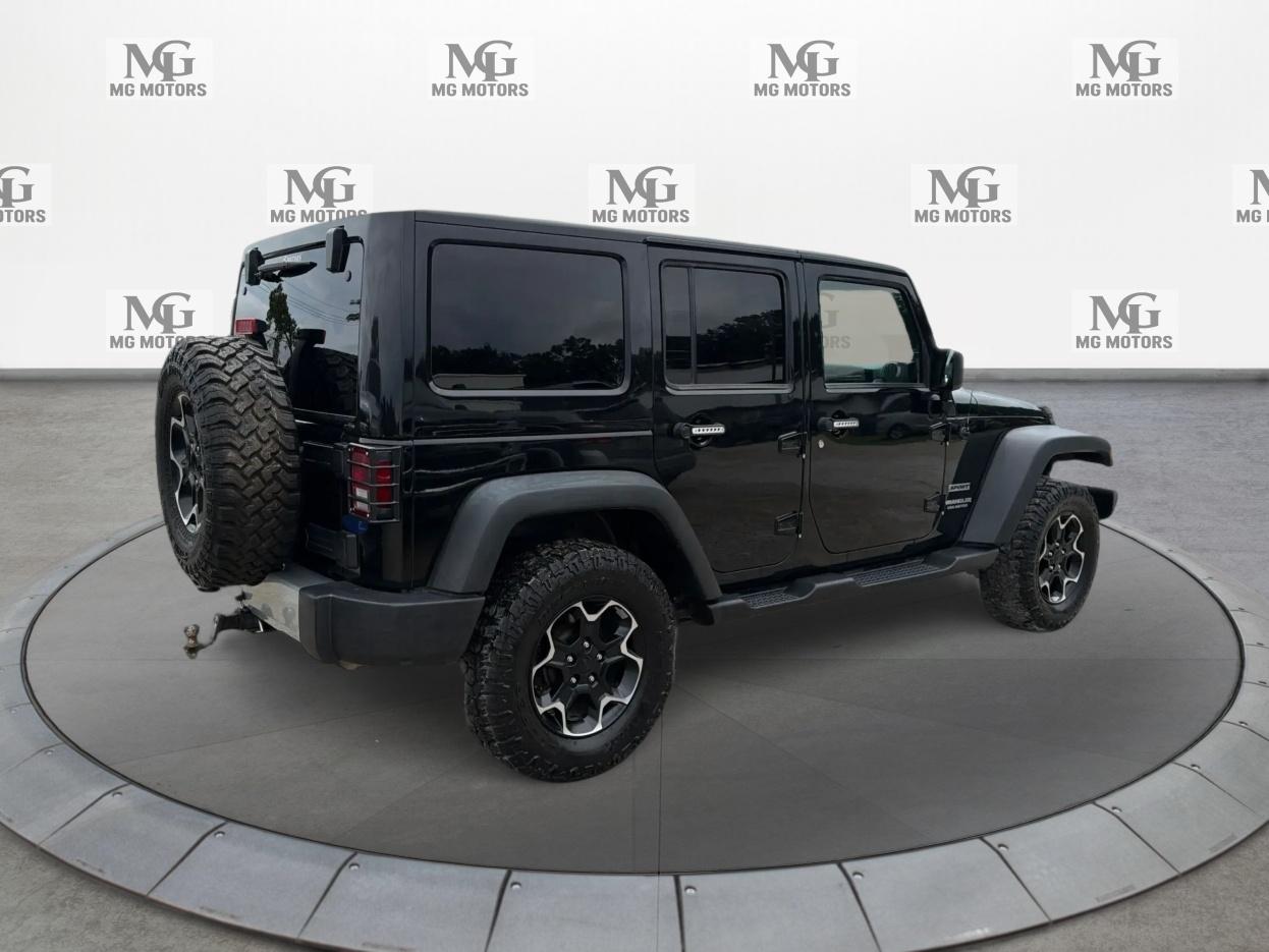 Jeep Wrangler Unlimited 4WD 4dr Sport 2012