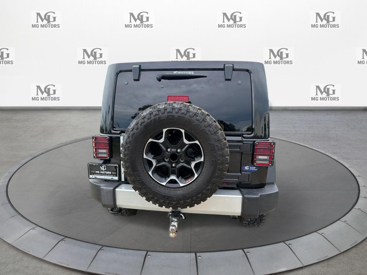 Jeep Wrangler Unlimited 4WD 4dr Sport 2012