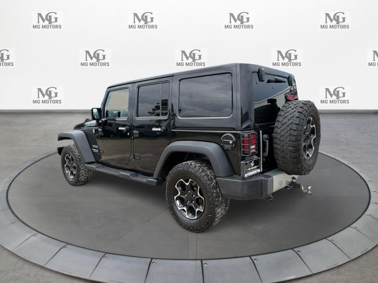 Jeep Wrangler Unlimited 4WD 4dr Sport 2012