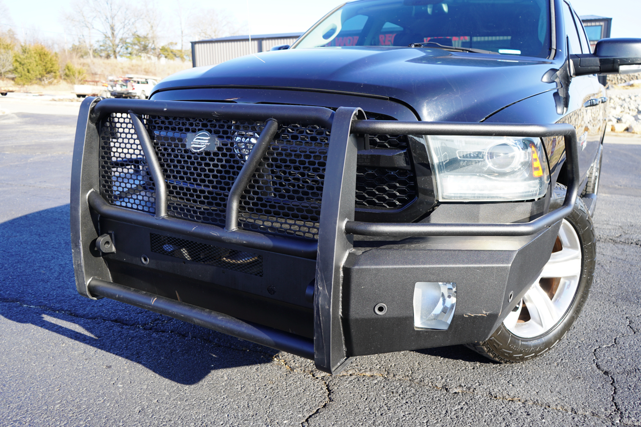 RAM 1500 4WD Crew Cab 140.5" Sport 2014