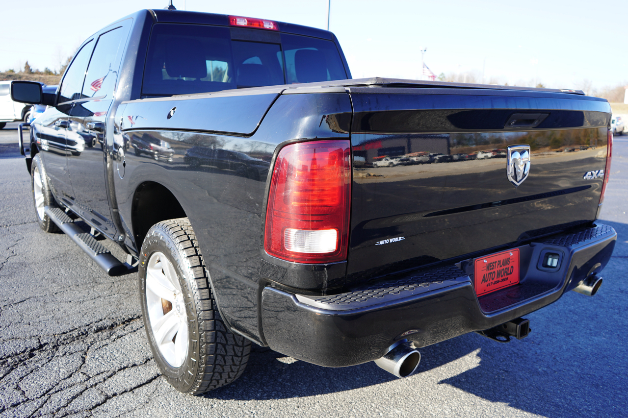RAM 1500 4WD Crew Cab 140.5" Sport 2014