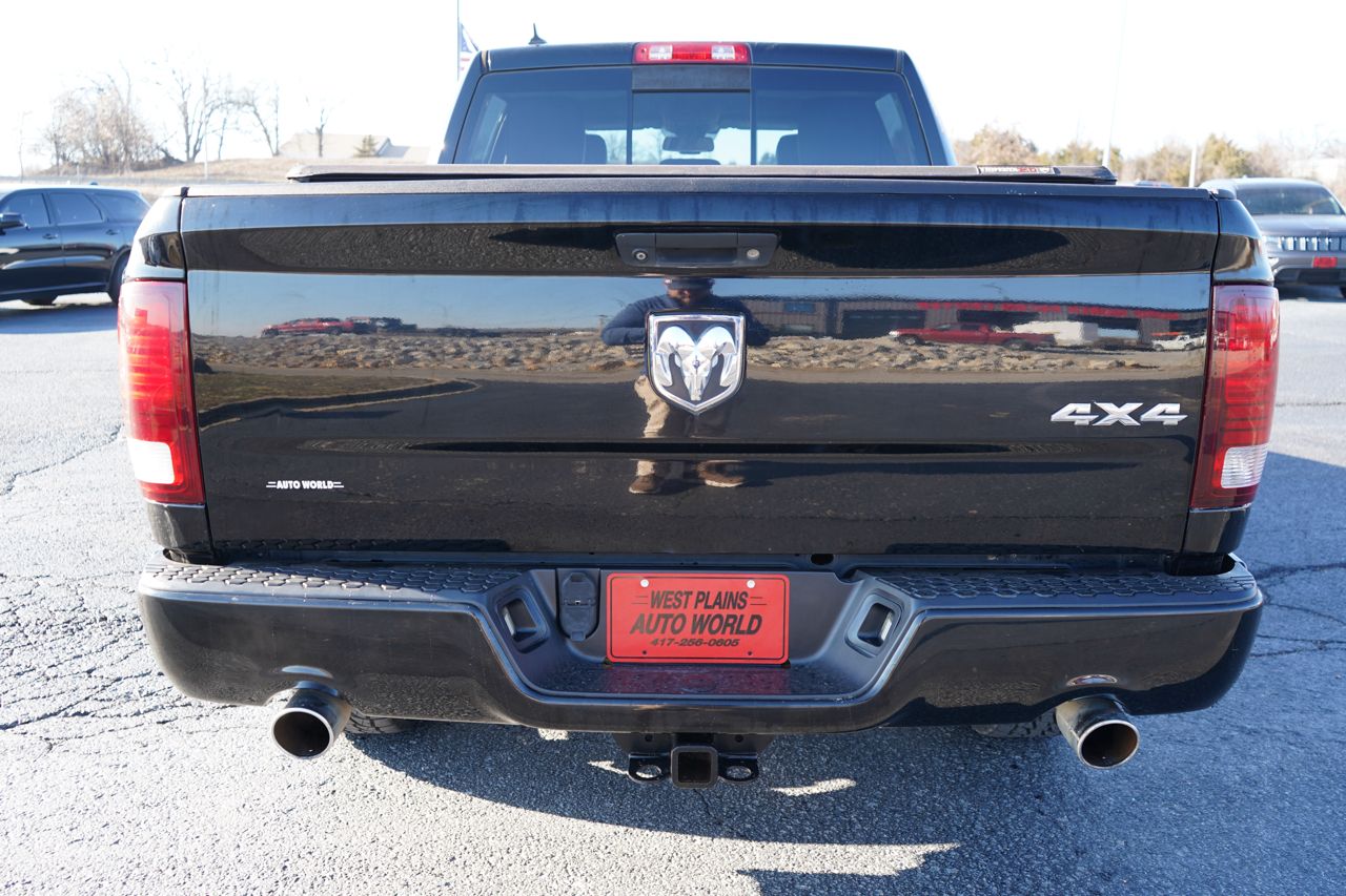 RAM 1500 4WD Crew Cab 140.5" Sport 2014