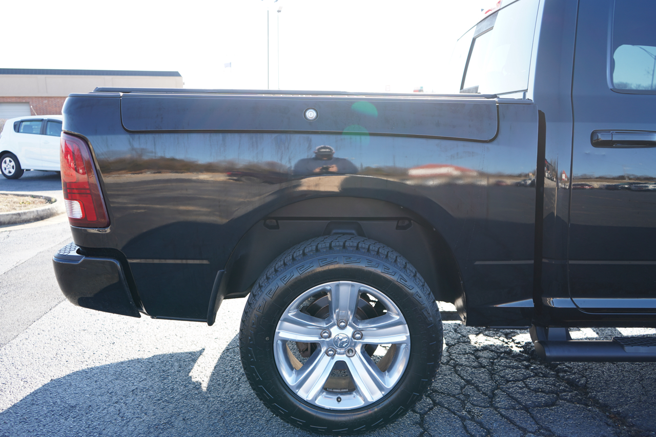 RAM 1500 4WD Crew Cab 140.5" Sport 2014