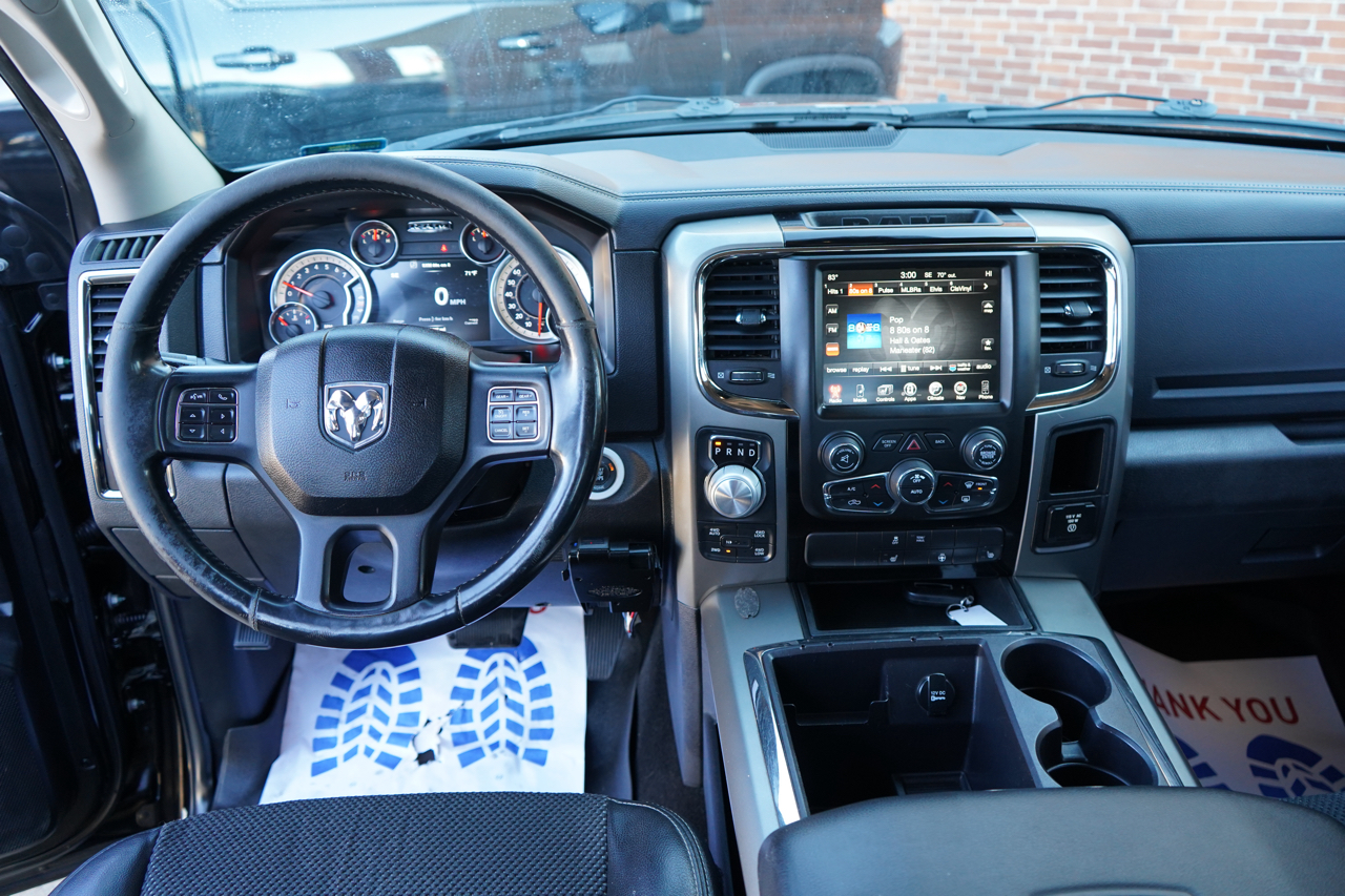 RAM 1500 4WD Crew Cab 140.5" Sport 2014