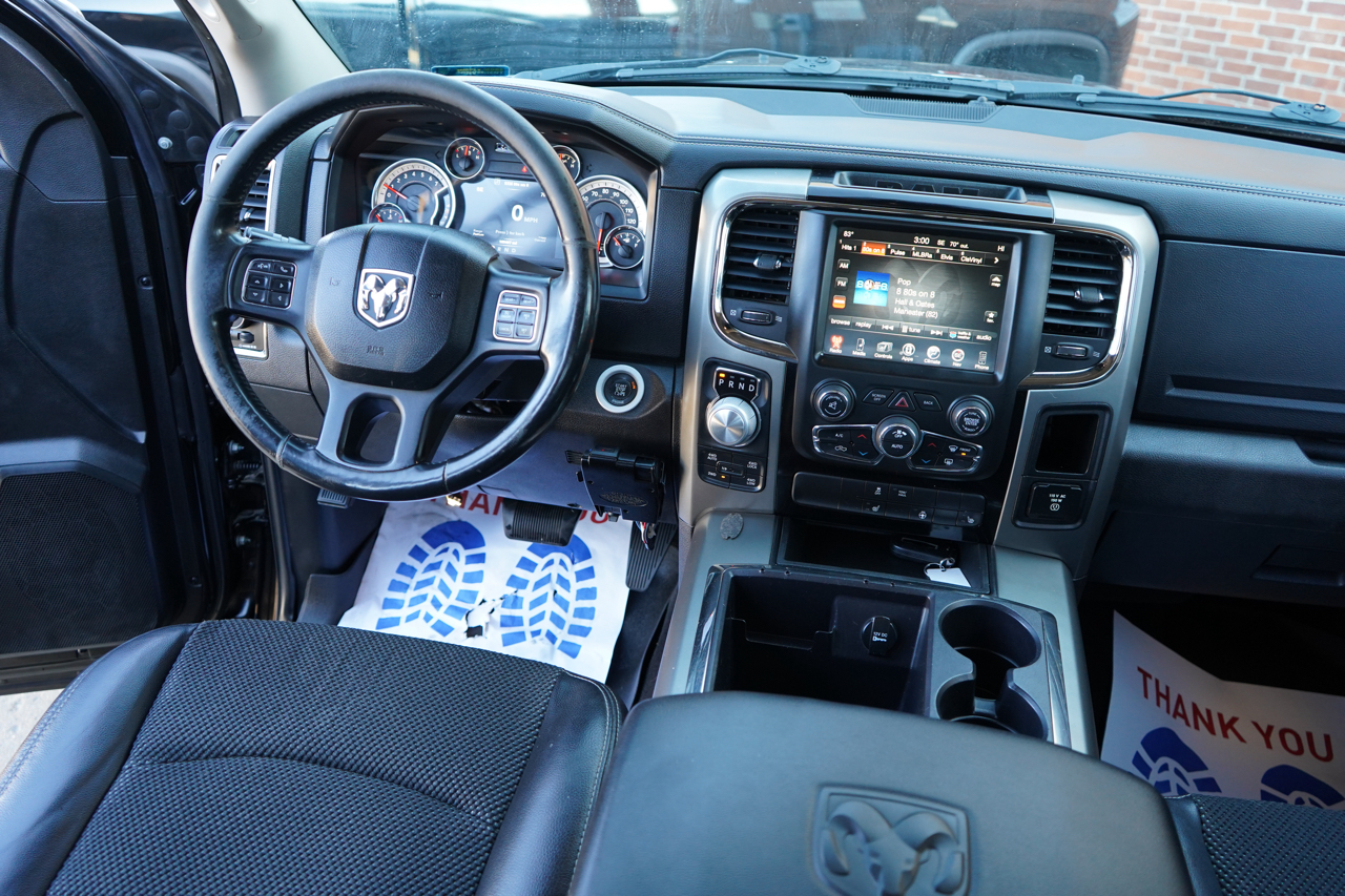 RAM 1500 4WD Crew Cab 140.5" Sport 2014