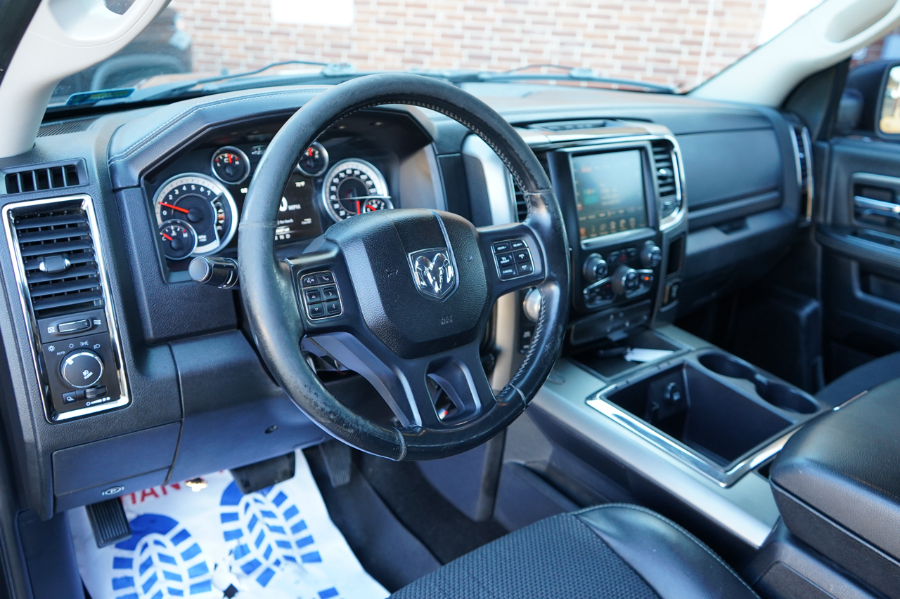 RAM 1500 4WD Crew Cab 140.5" Sport 2014