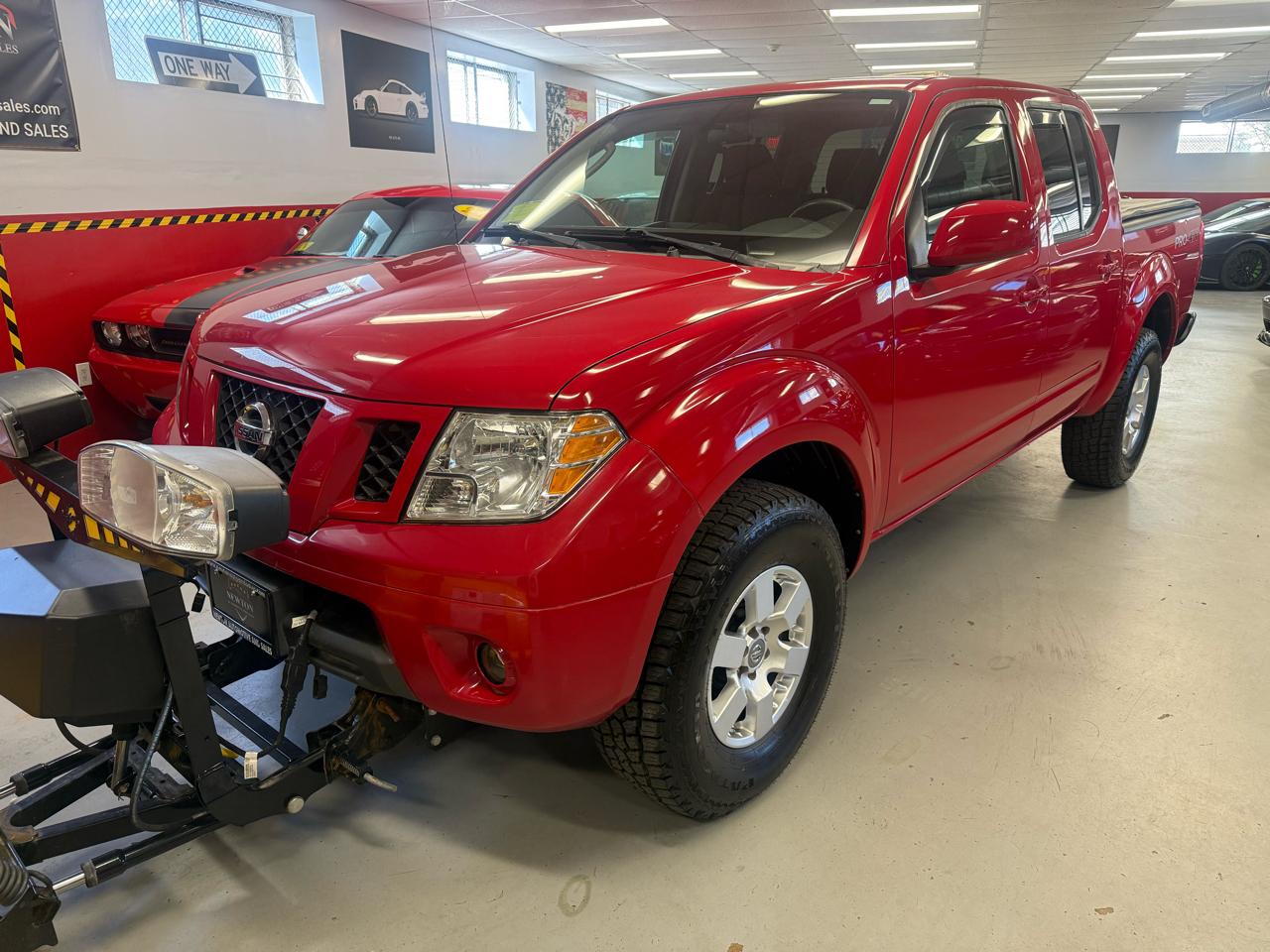 Nissan Frontier LE Crew Cab 4WD 2010