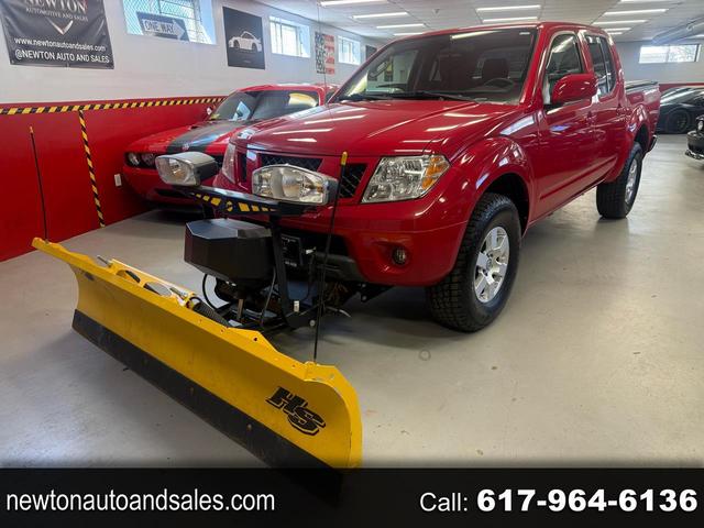 Red Alert 2010 Nissan Frontier LE Crew Cab 4WD Pickup Truck Four-Wheel Drive Automatic