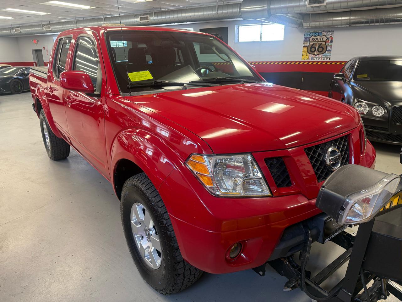 Nissan Frontier LE Crew Cab 4WD 2010
