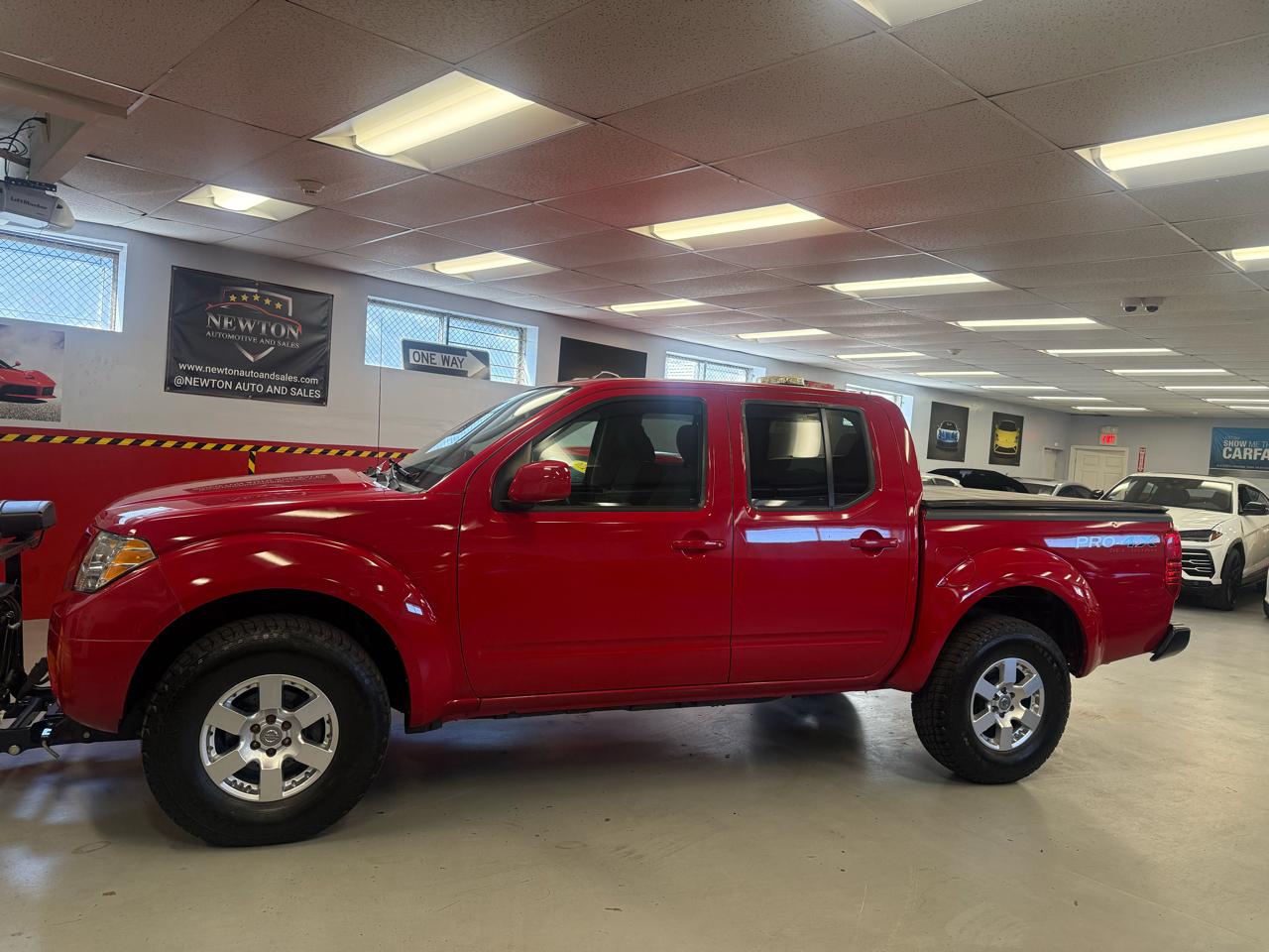 Nissan Frontier LE Crew Cab 4WD 2010