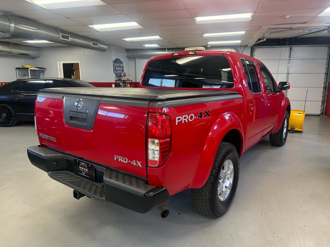 Nissan Frontier LE Crew Cab 4WD 2010