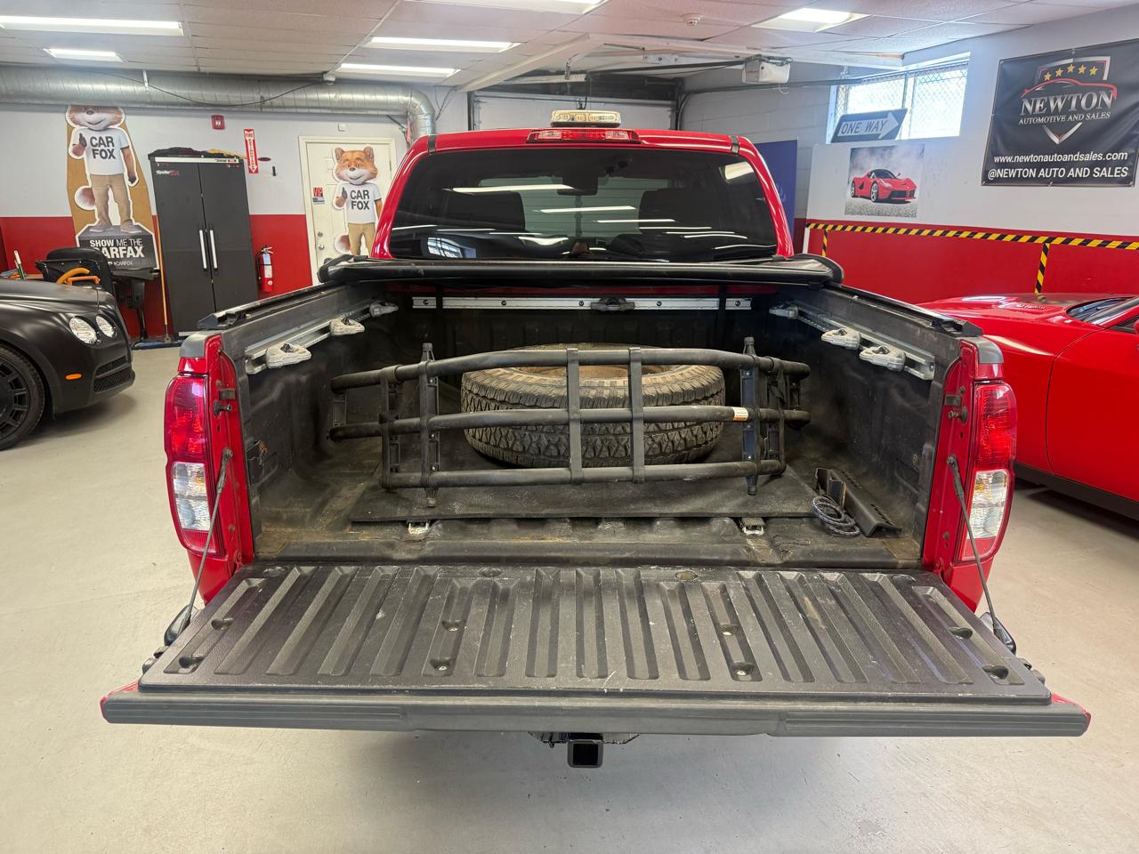 Nissan Frontier LE Crew Cab 4WD 2010