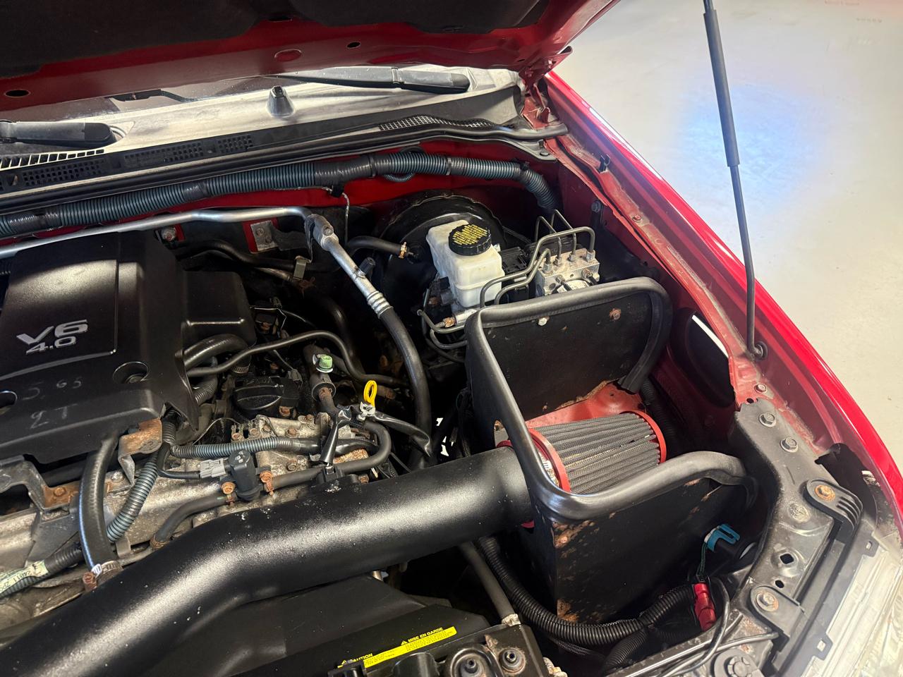 Nissan Frontier LE Crew Cab 4WD 2010