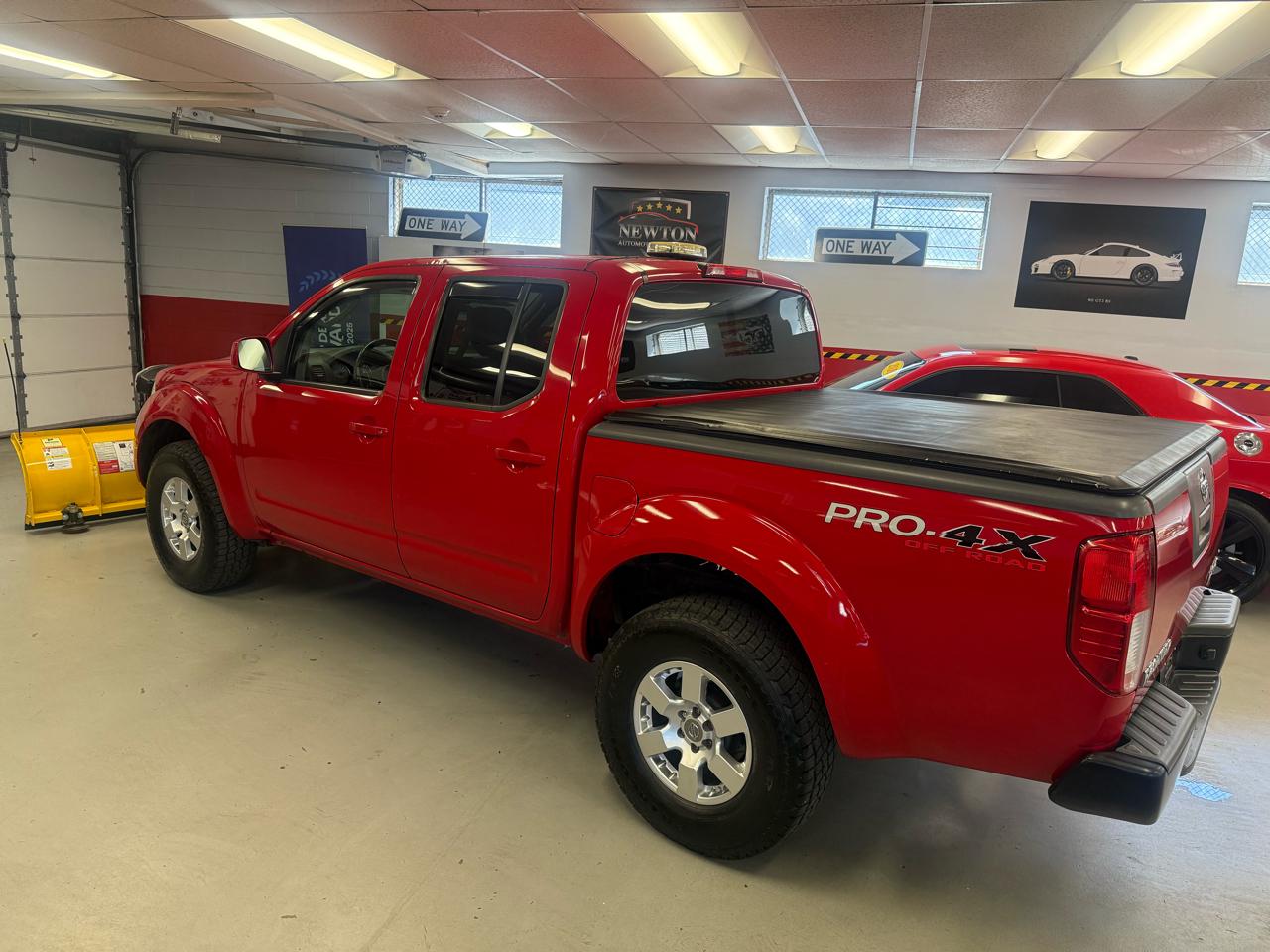 Nissan Frontier LE Crew Cab 4WD 2010