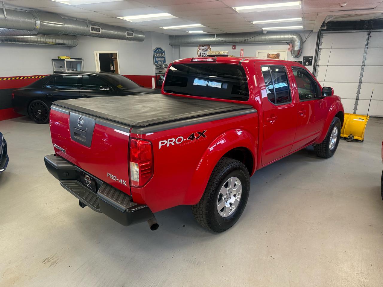 Nissan Frontier LE Crew Cab 4WD 2010