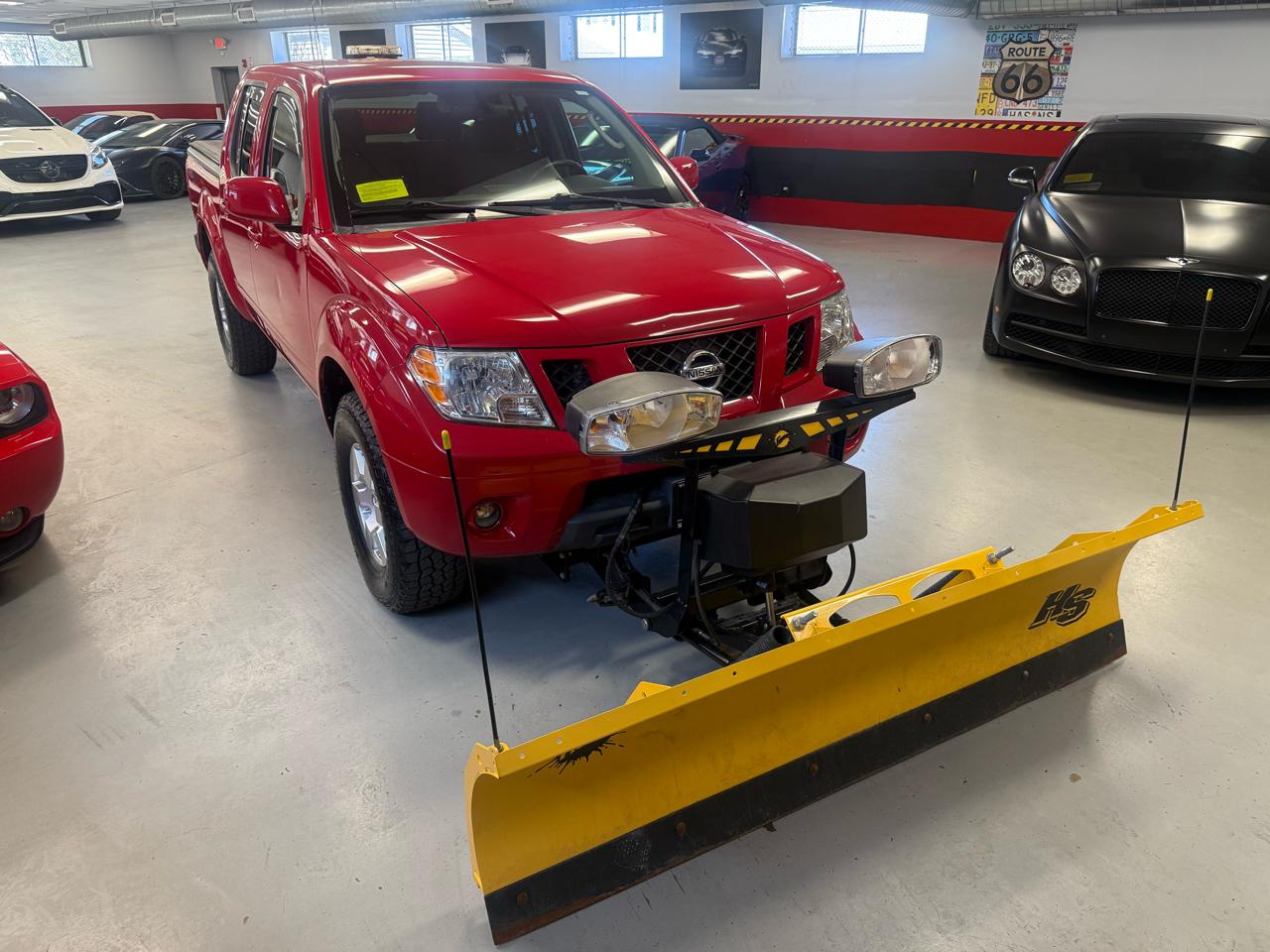 Nissan Frontier LE Crew Cab 4WD 2010