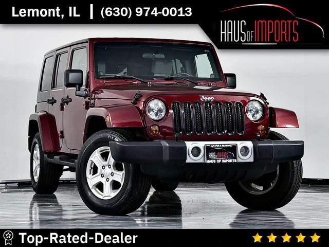 Red (Maroon) 2009 Jeep Wrangler Unlimited Sahara 4WD SUV / Crossover Four-Wheel Drive 6-Speed Manual