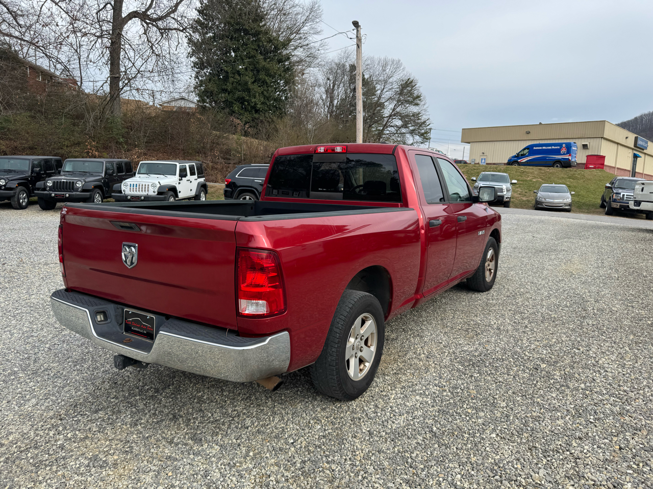 Dodge Ram 1500 2WD Quad Cab 140.5" SLT 2009