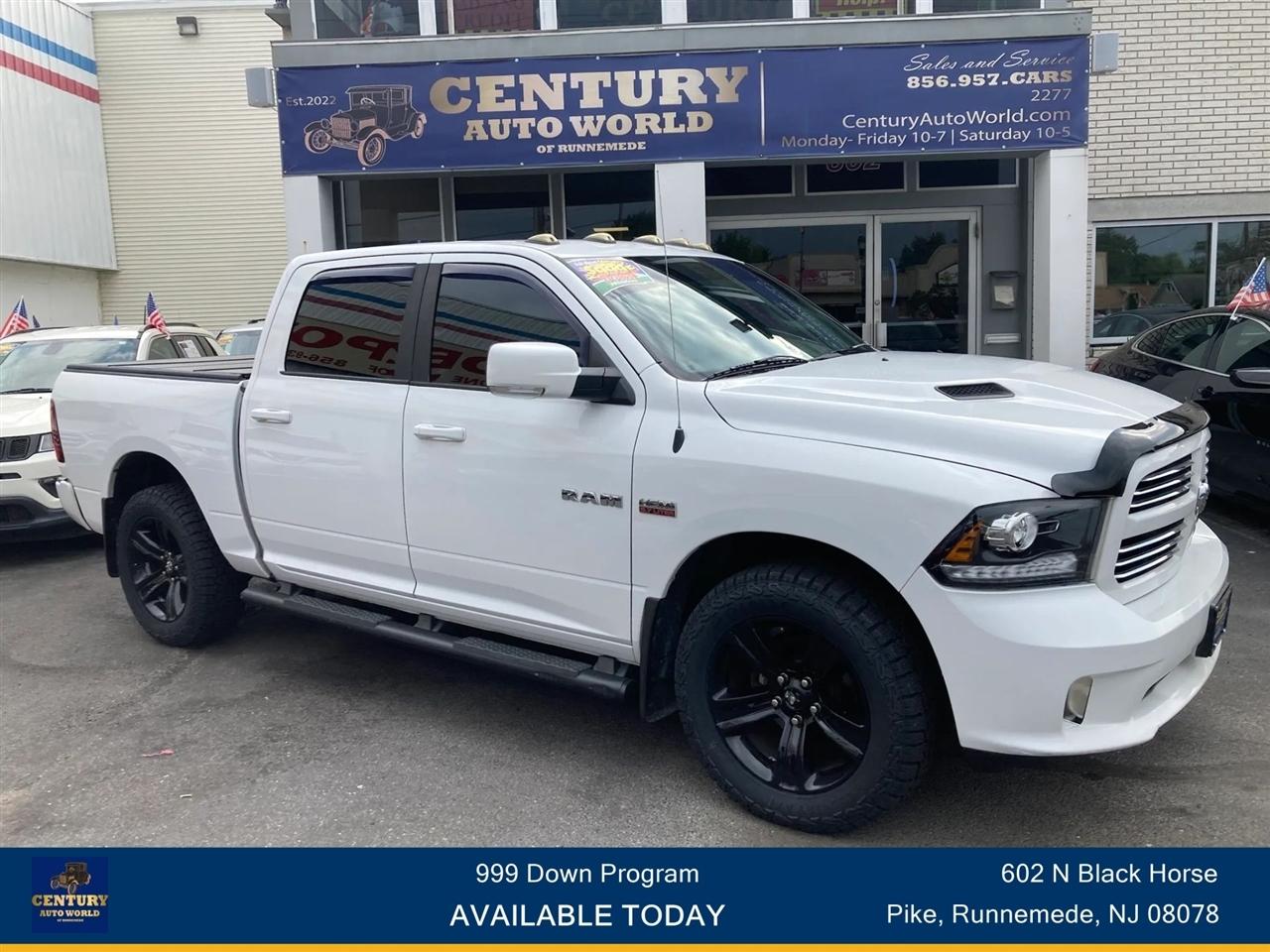 2015 RAM 1500 4WD Crew Cab 140.5" Sport