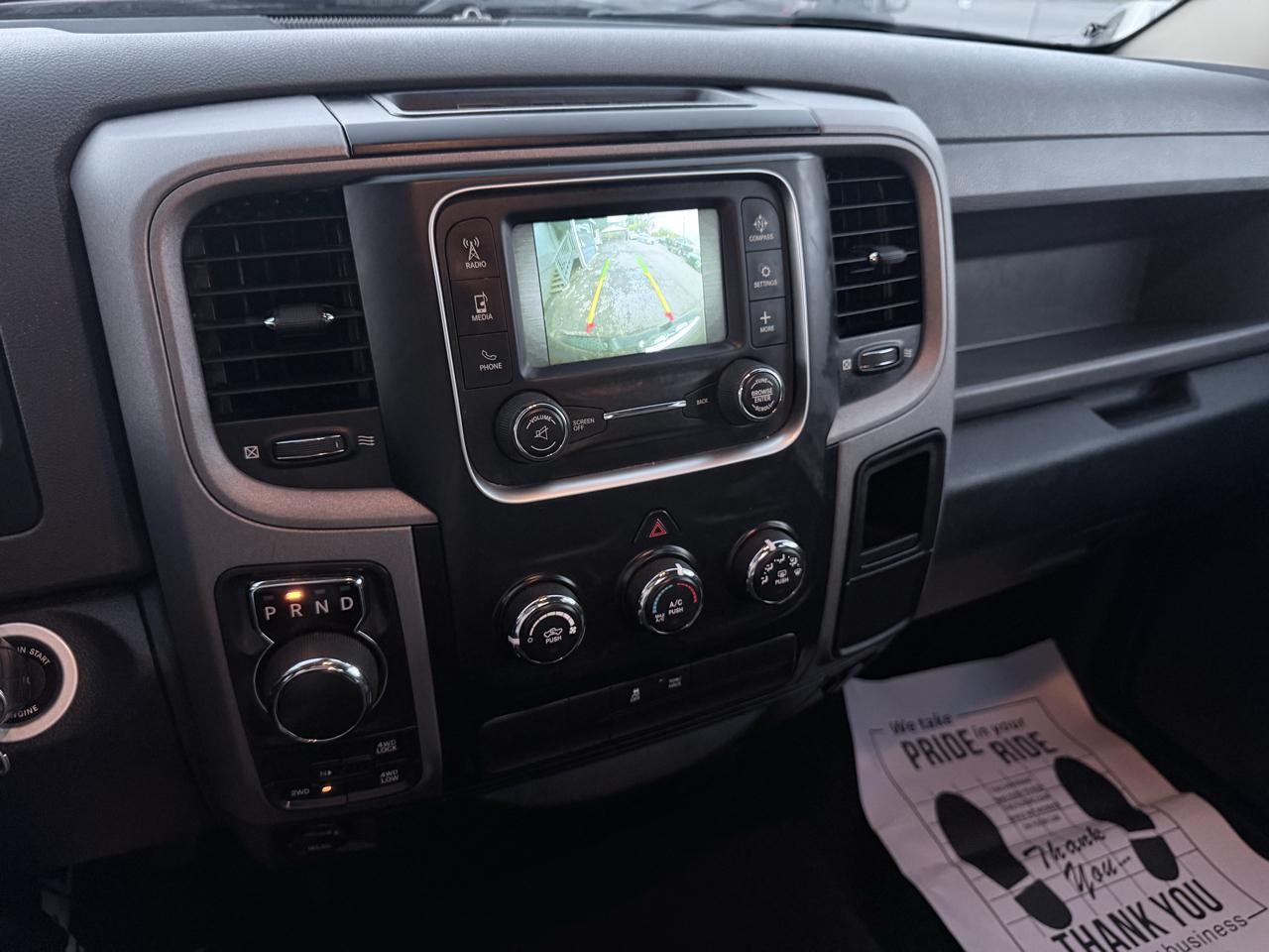 RAM 1500 4WD Quad Cab 140.5" ST 2016