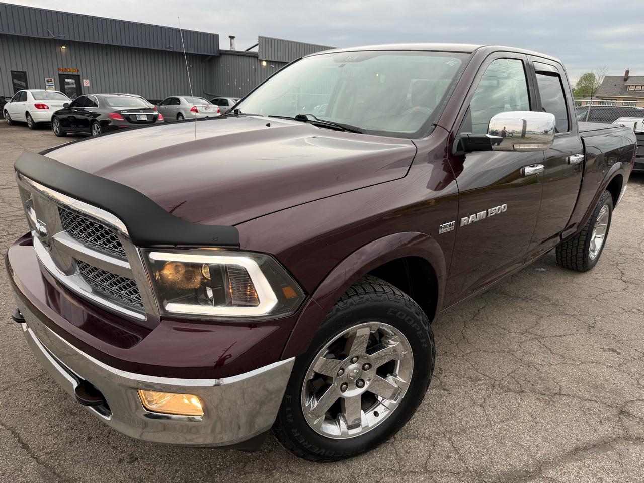 RAM 1500 4WD Quad Cab 140.5" Laramie 2012