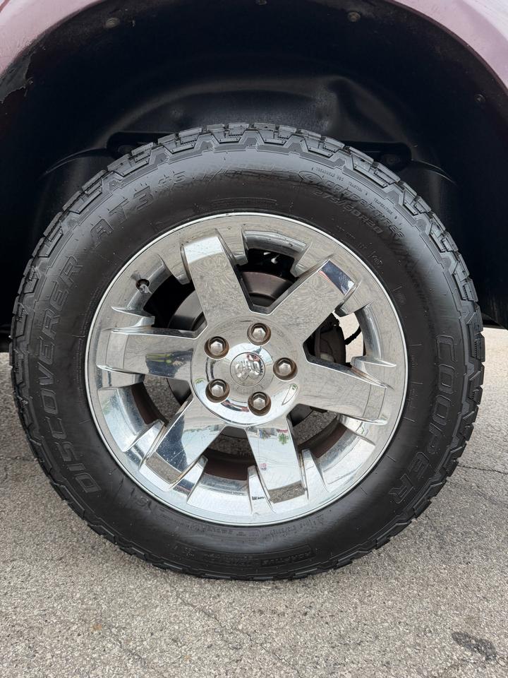 RAM 1500 4WD Quad Cab 140.5" Laramie 2012