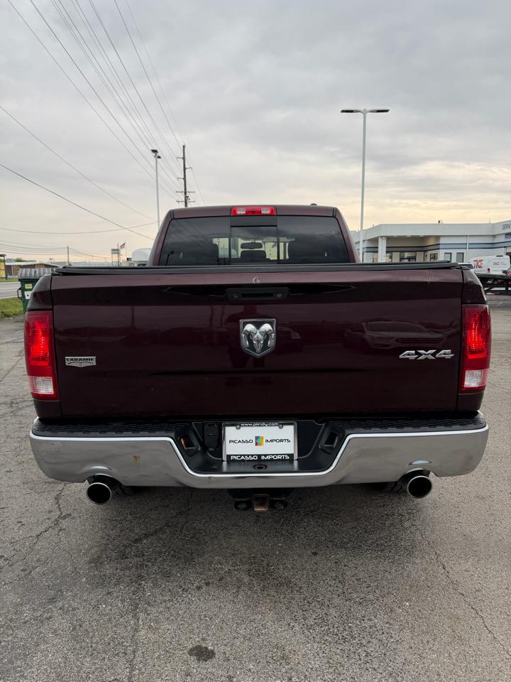 RAM 1500 4WD Quad Cab 140.5" Laramie 2012