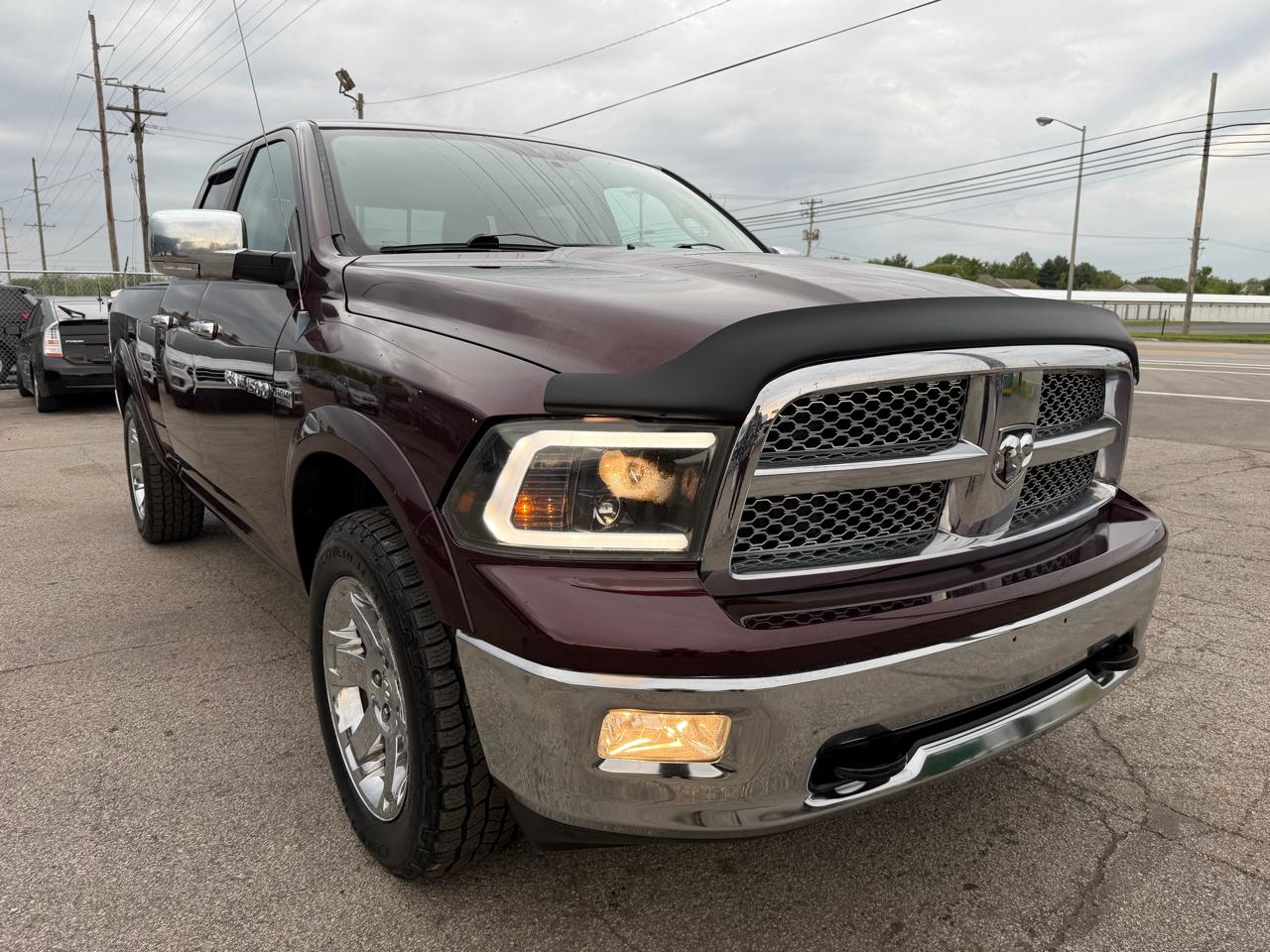 RAM 1500 4WD Quad Cab 140.5" Laramie 2012