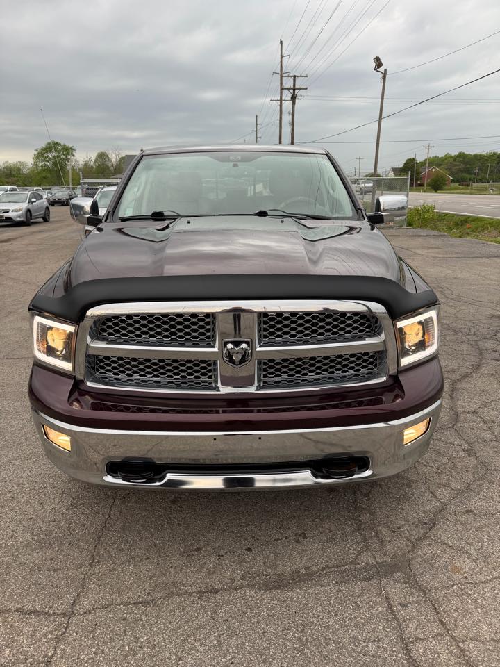 RAM 1500 4WD Quad Cab 140.5" Laramie 2012