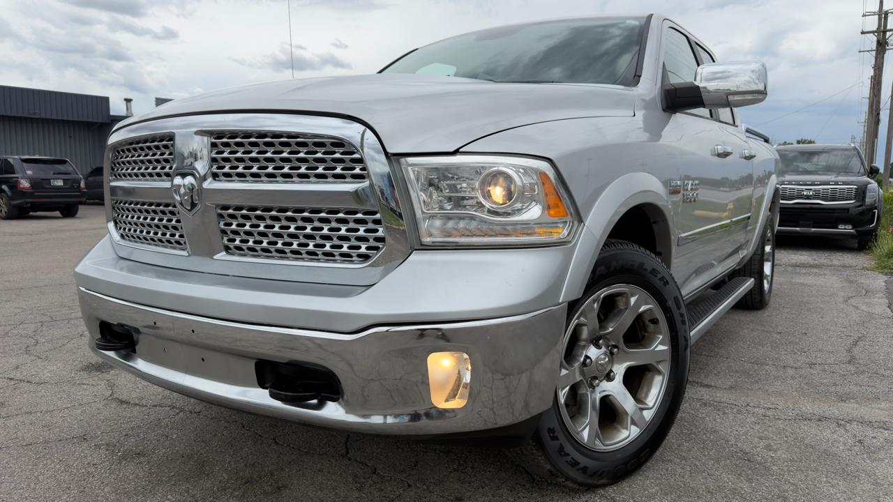 RAM 1500 4WD Quad Cab 140.5" Laramie 2013