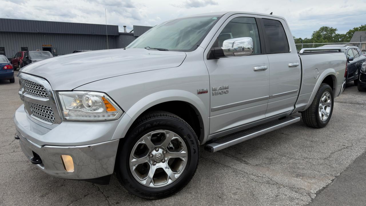 RAM 1500 4WD Quad Cab 140.5" Laramie 2013