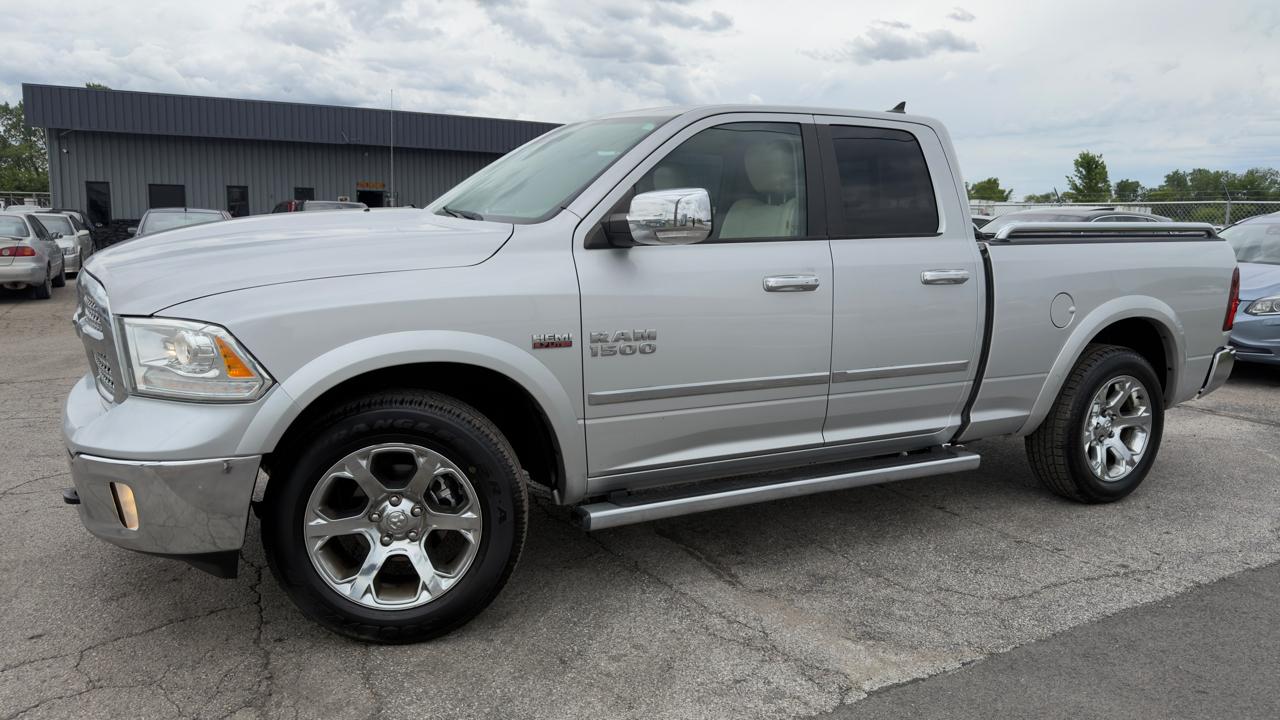 RAM 1500 4WD Quad Cab 140.5" Laramie 2013