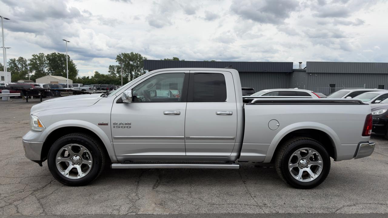 RAM 1500 4WD Quad Cab 140.5" Laramie 2013