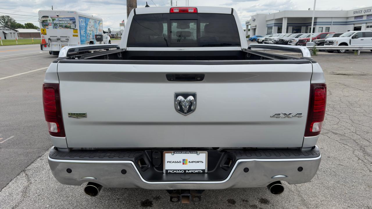 RAM 1500 4WD Quad Cab 140.5" Laramie 2013