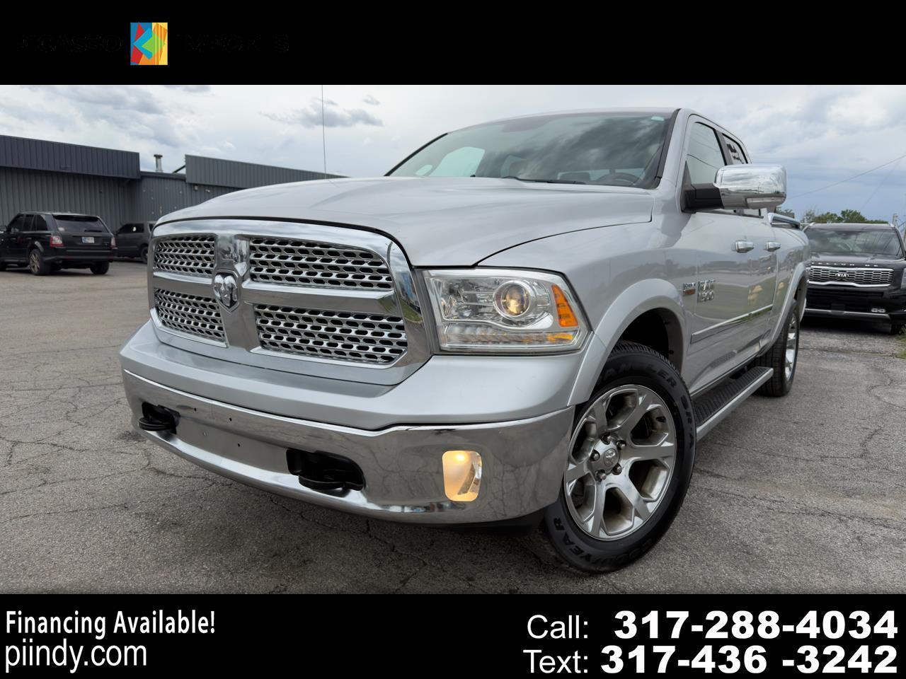 RAM 1500 4WD Quad Cab 140.5" Laramie 2013