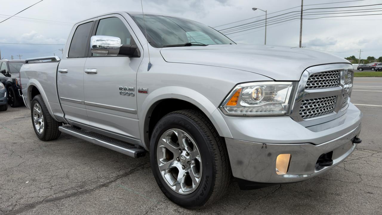 RAM 1500 4WD Quad Cab 140.5" Laramie 2013