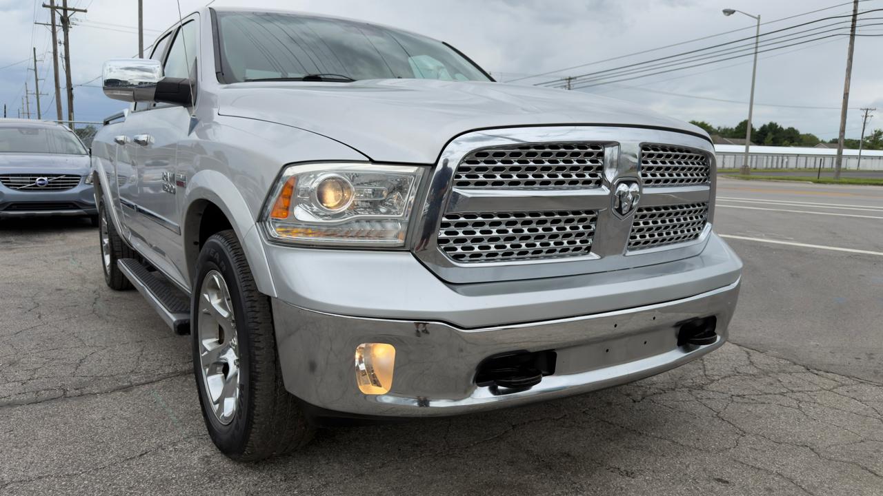 RAM 1500 4WD Quad Cab 140.5" Laramie 2013