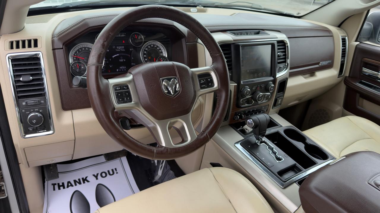 RAM 1500 4WD Quad Cab 140.5" Laramie 2013