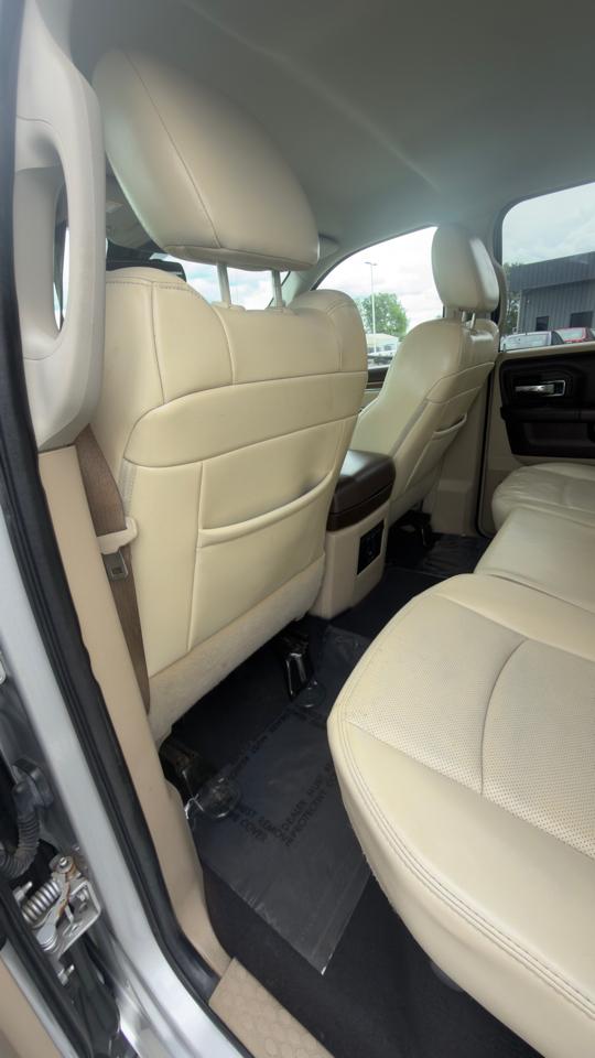 RAM 1500 4WD Quad Cab 140.5" Laramie 2013