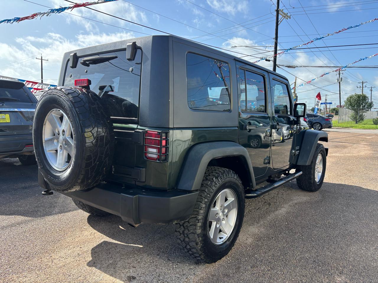 Jeep Wrangler Unlimited 4WD 4dr Sport 2010